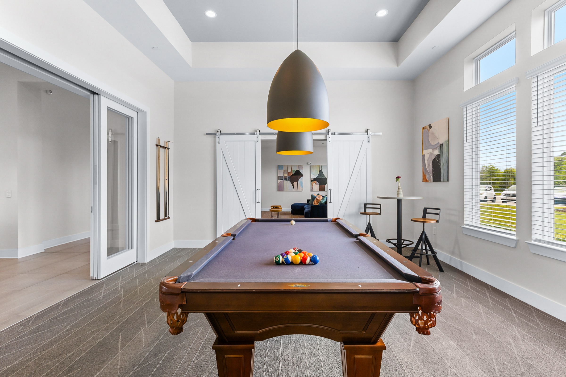 Academy Park game room with billiards table