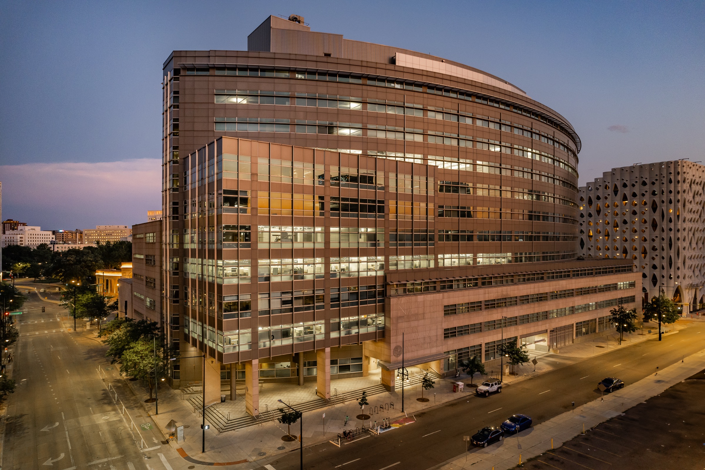 Commercial civic building exterior at dusk