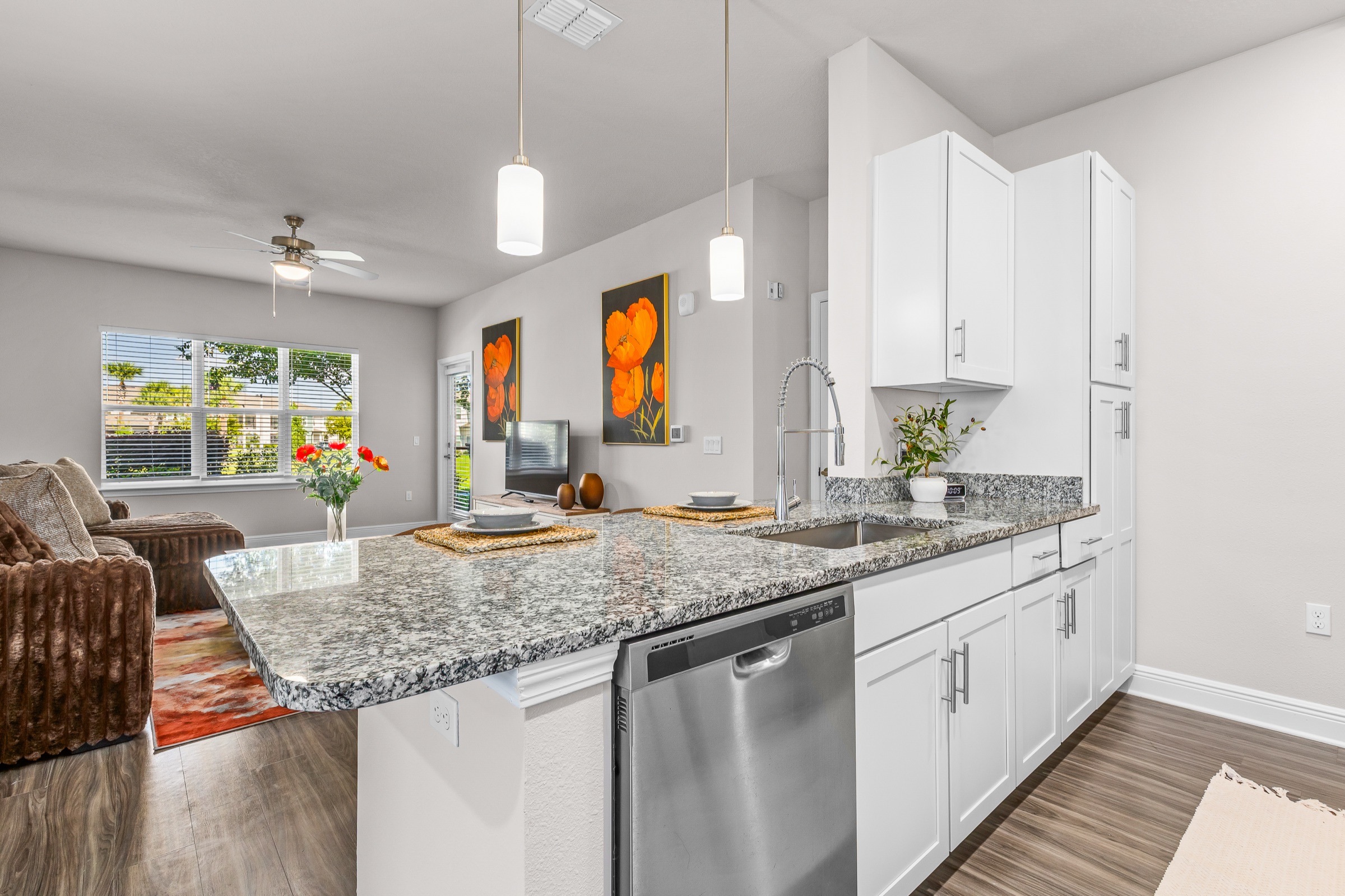 Multifamily model unit kitchen and living interior
